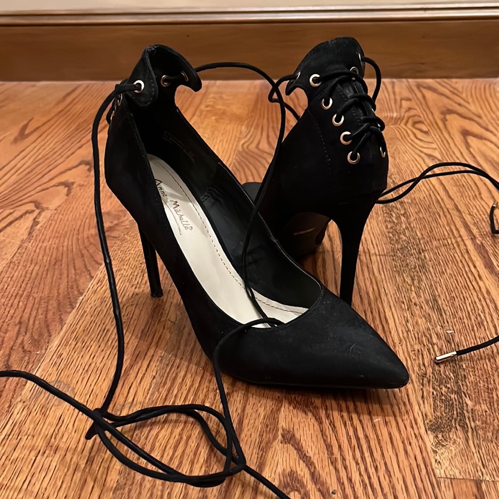 Black pumps with ankle strap, size 8.5